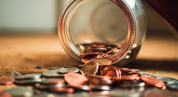 pennies spilling from a jar